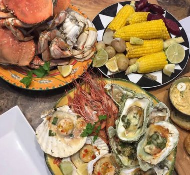 Kettle o Fish Baked Oysters Lobster and corn picnic meal